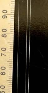 Three fibrin microthreads mm scale bar