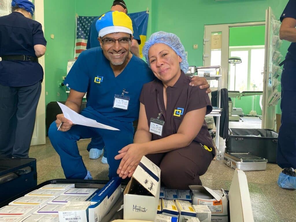 Dr. Manoj T. Abraham with a member of the local Ukraine team. 